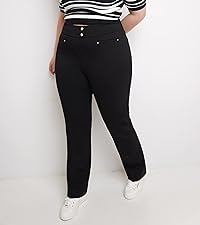Model wears black plus size pant with sneakers and a striped top